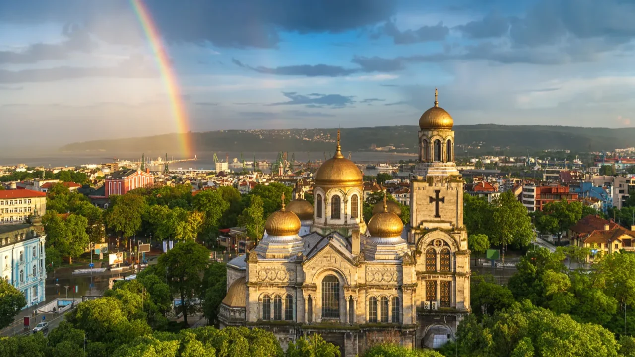 rainbow over the the cathedral of the assumption in varnaaerial