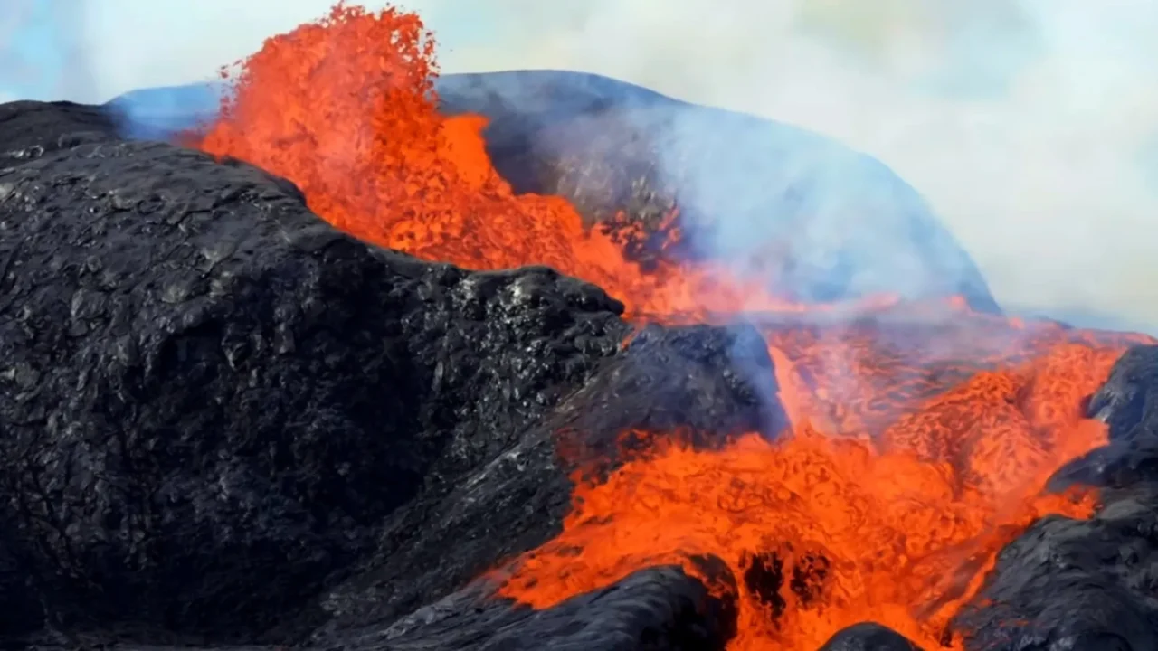 red volcanic eruptions falling down from volcano