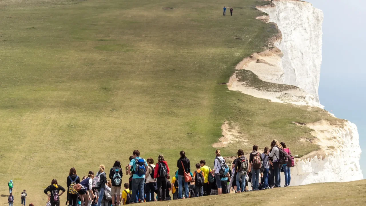 school trip pausing before the ascent on the south downs