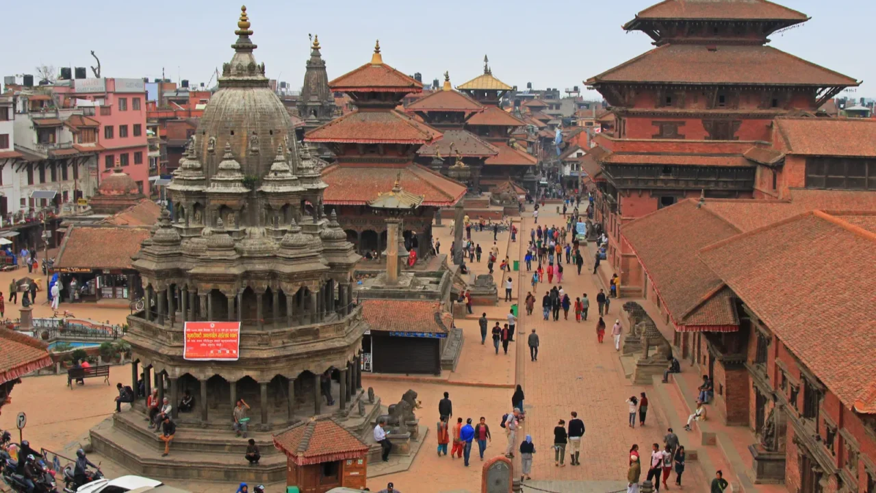 tourists and local people visiting patan durbar square in patan