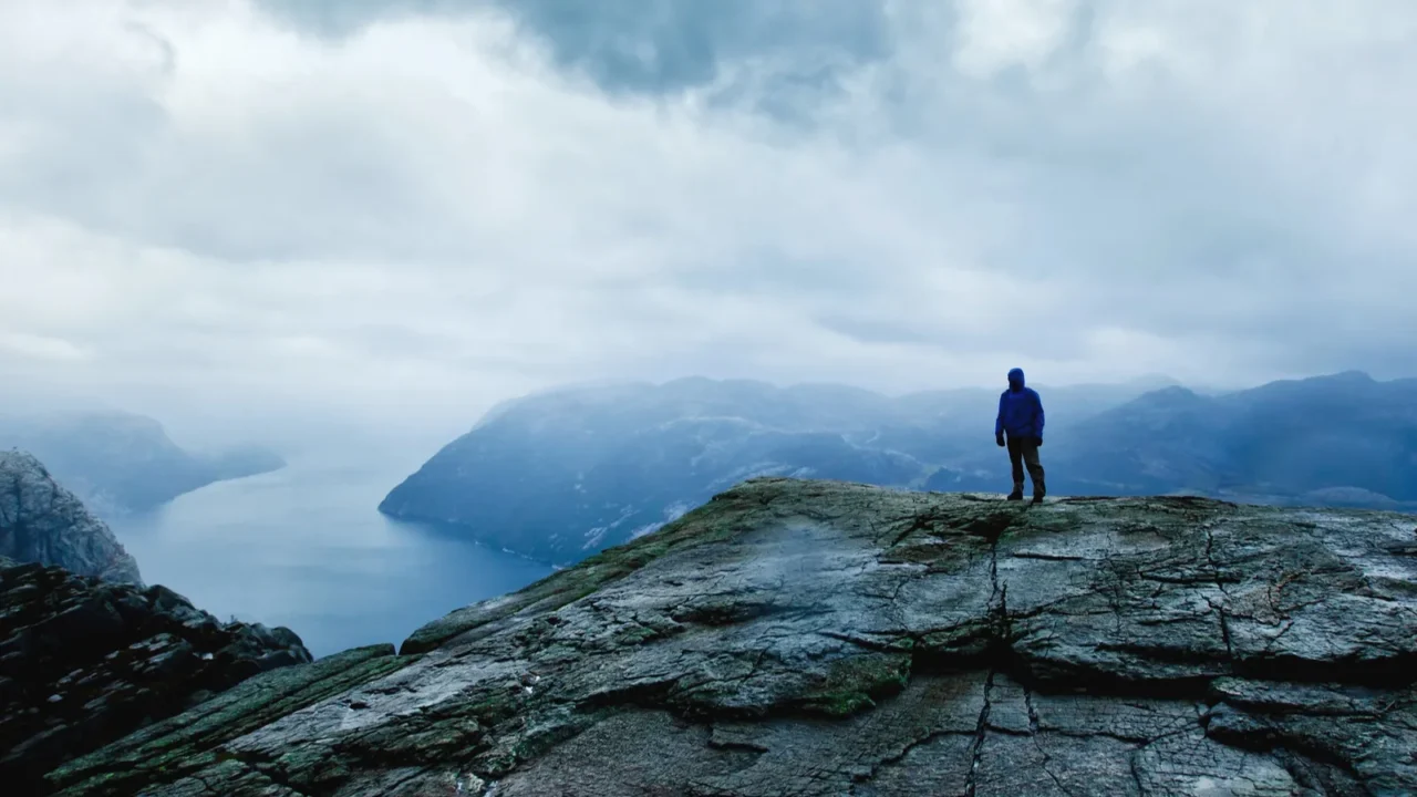traveler on the top of the mountain
