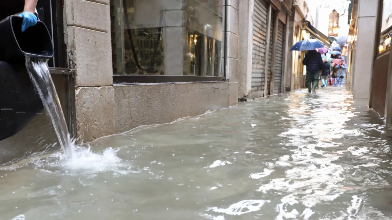 venetian street completely submerged by high tide and the emptyi