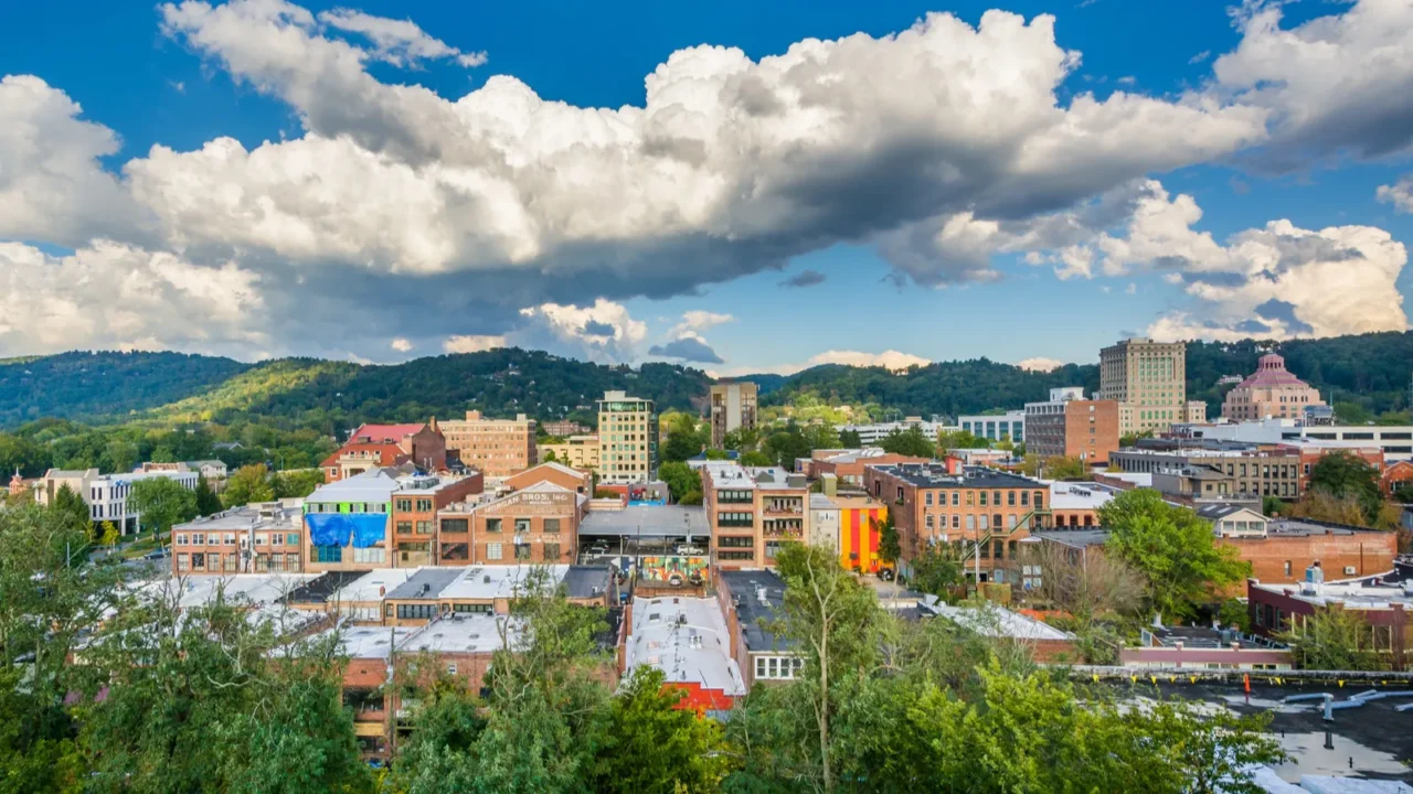 view of mountains and buildings in downtown asheville north car