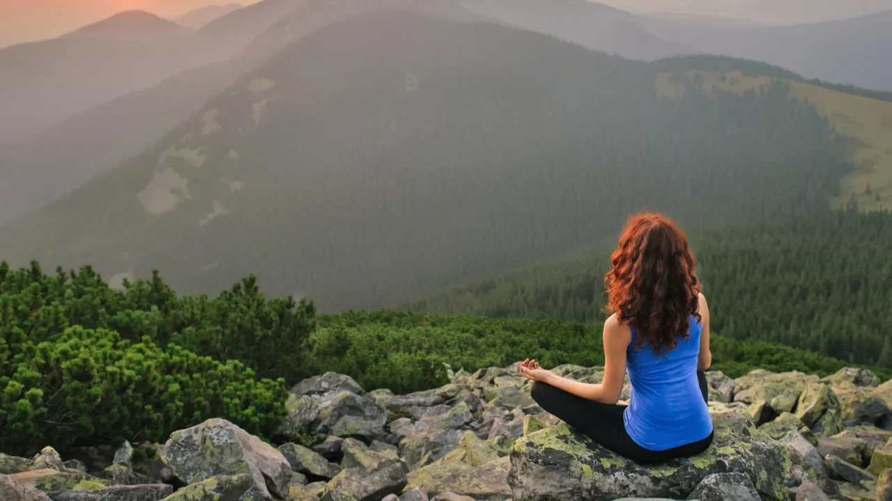 woman relaxing in the nature on sunset