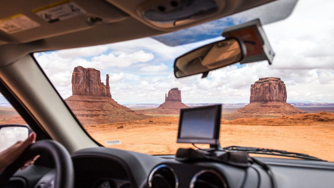 GPS device in a car, satellite navigation system in Monument Valley, USA.
