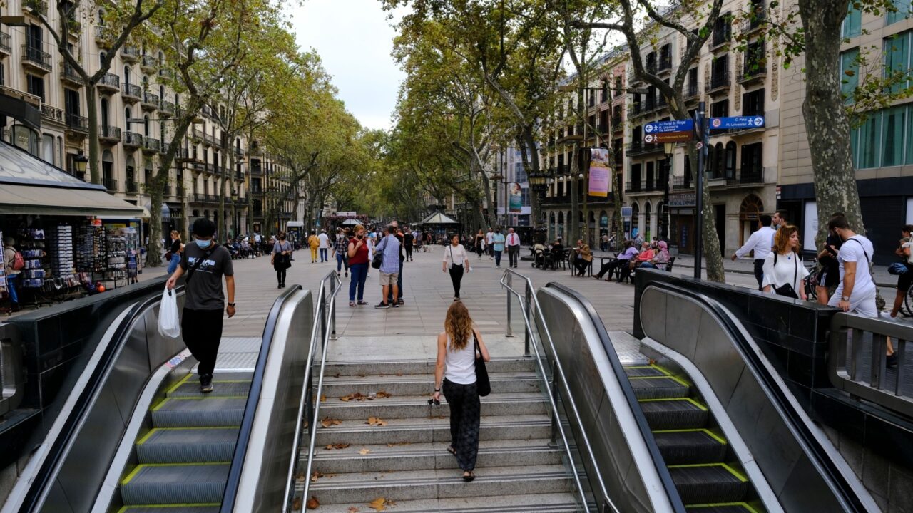 A tourist walks in central streets in Barcelona, Catalonia, Spain on October 3, 2021.