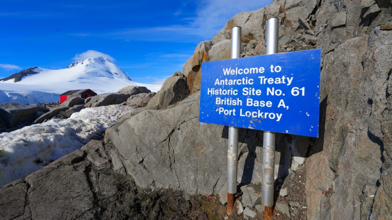 Welcome sign to Port Lockroy, a historic British base located on Goudier Island in the Palmer Archipelago, west of the Antarctic Peninsula