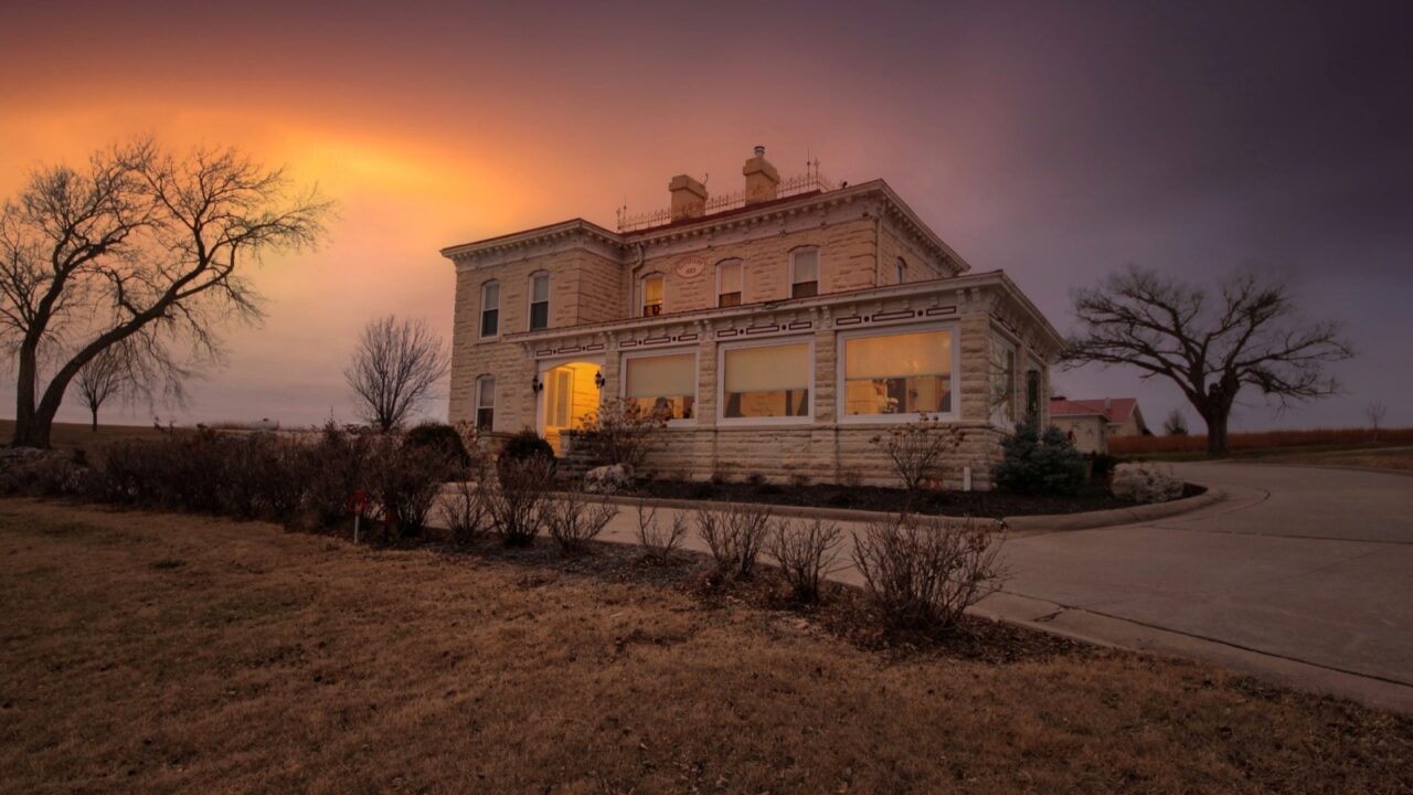 The Clover Cliff Ranch during a cloudy winter sunset.