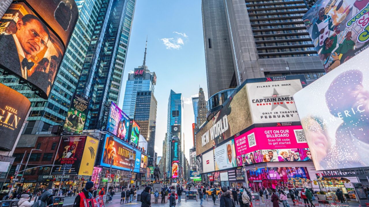 Times Square, Manhattan, New York, U.S.-January 08, 2025: tourists are visiting the Times Square with colorful lights in Manhatan. US