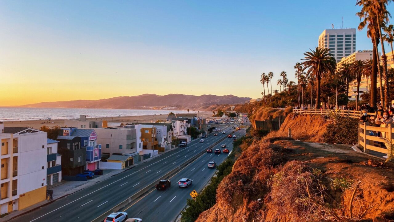 Pacific Coast Highway and beachside cliffs at sunset in Santa Monica