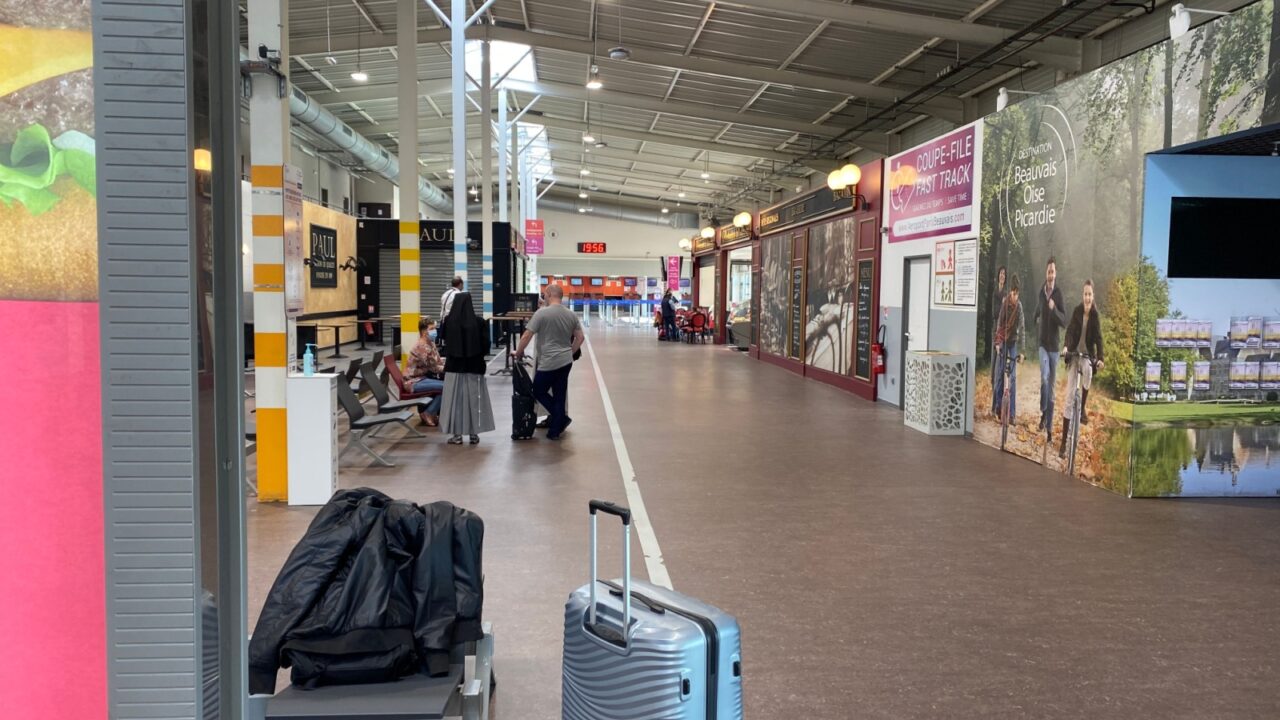 Beauvais France airport june 2020. Airport empty interior of airport lobby beginnings after pandemic. closed bars restaurants few tourist
