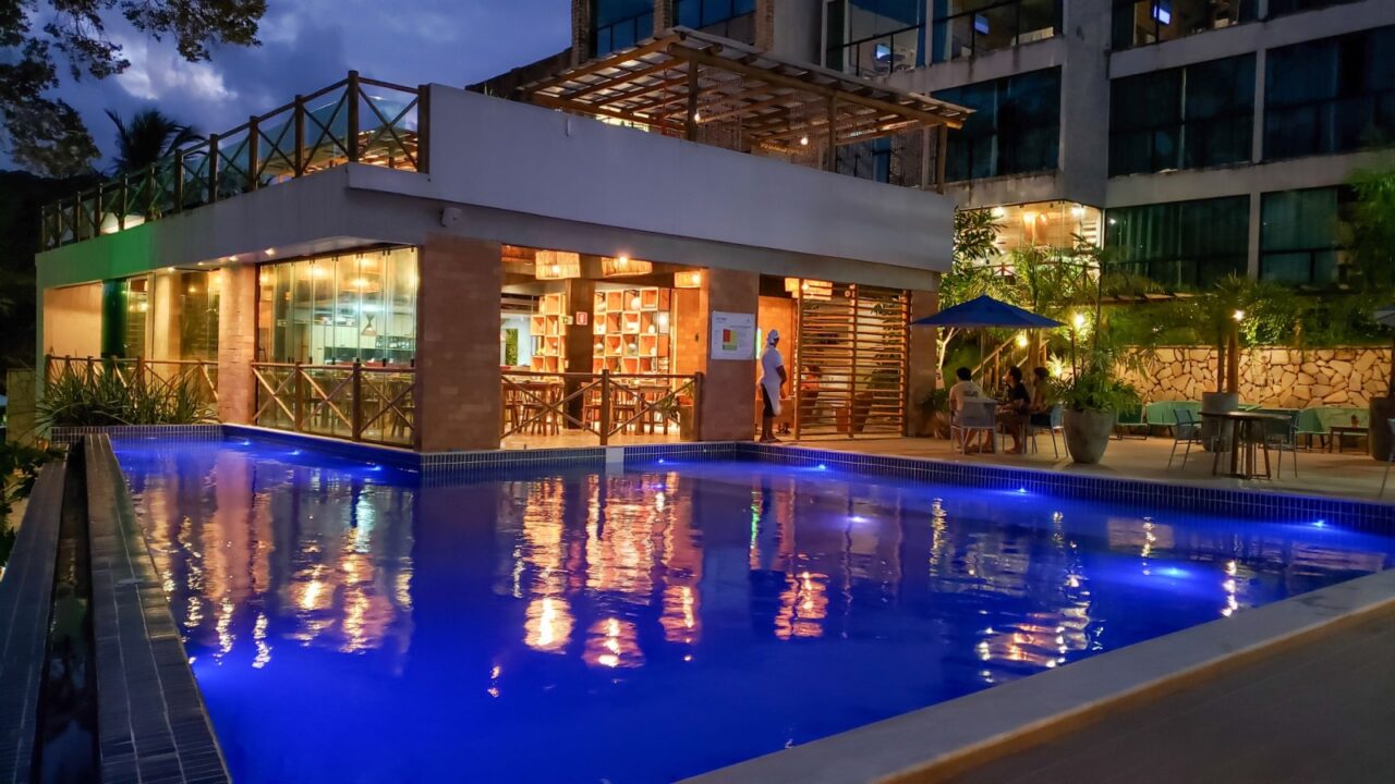 Fancy hotel swimming pool at night. Light reflexes. Japaratinga, AL, Brazil. May 23, 2021.
