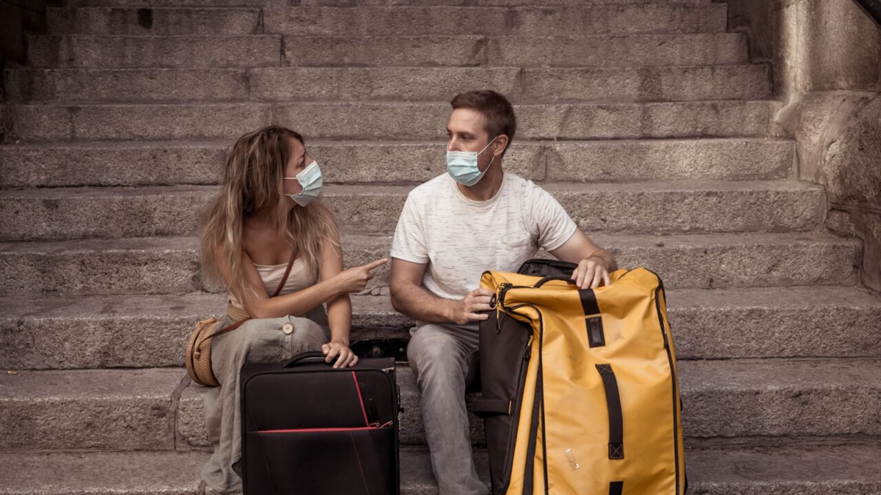 Unhappy tourist couple not able to travel abroad due to Post-covid Travel restrictions