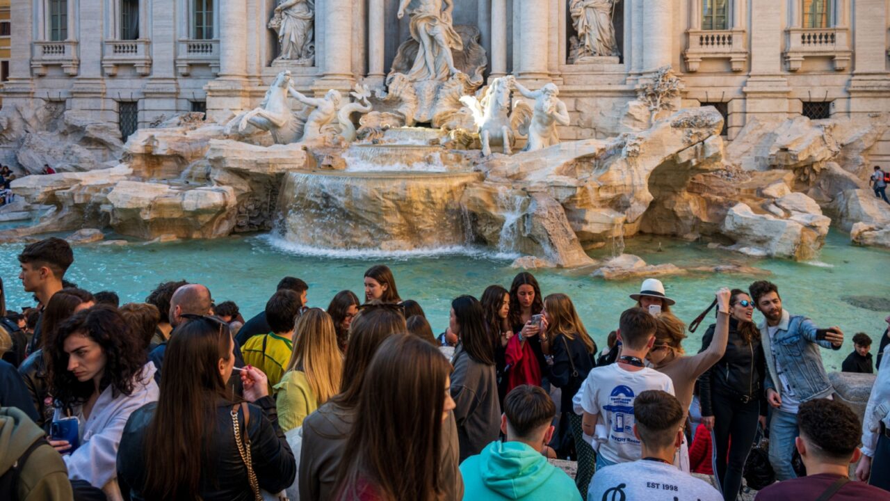 Rome, Italy, April. 2023 One of the absolute tourist hotspots in Rome is the Trevi Fountain that draws the crowds