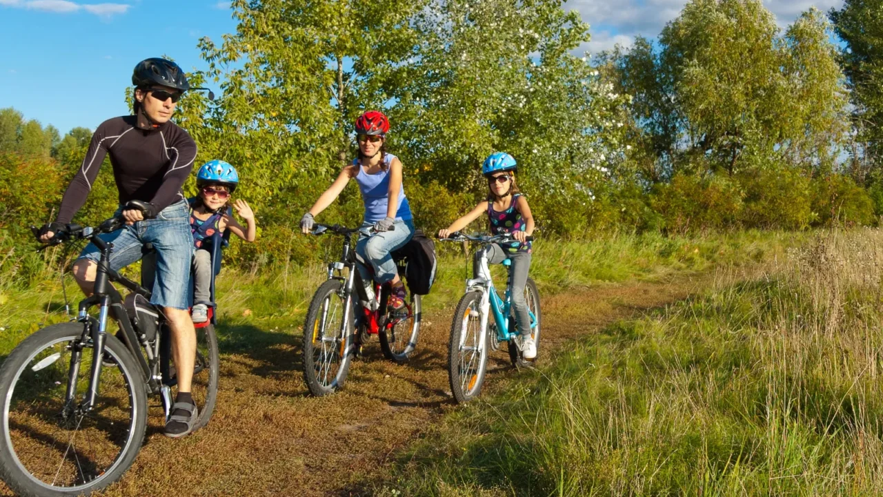 active family cycling outdoors