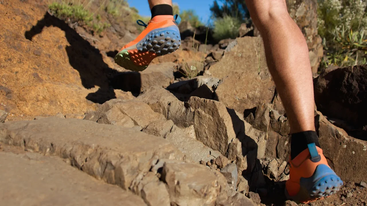 athlete running sport feet on trail selective focus on soletraining