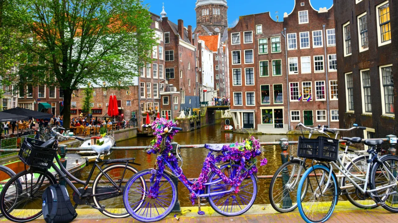 bicycles over canal amsterdam city picturesque landscape in the nitherlands