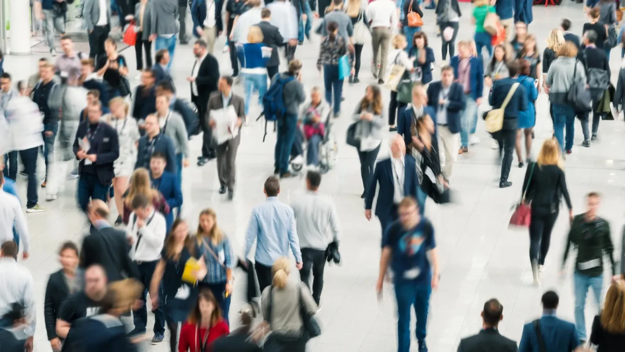 blurred people in a modern hall