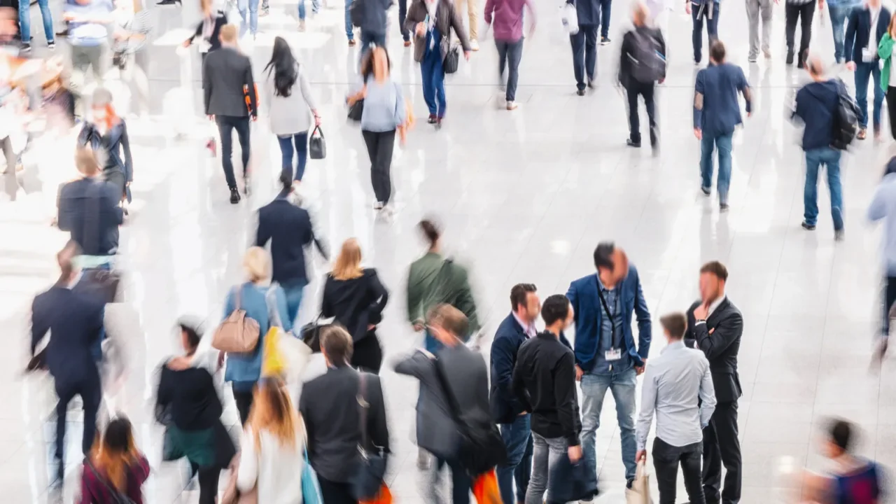blurred people in a modern hall