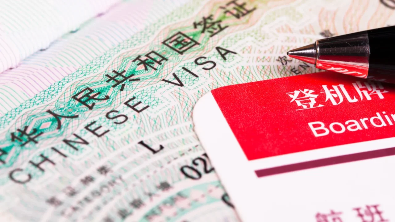 china visa in passport and boarding pass