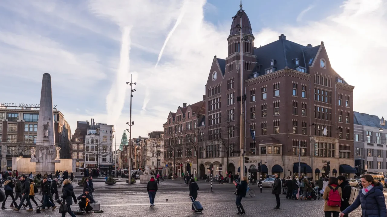 dam square amsterdam in the morning