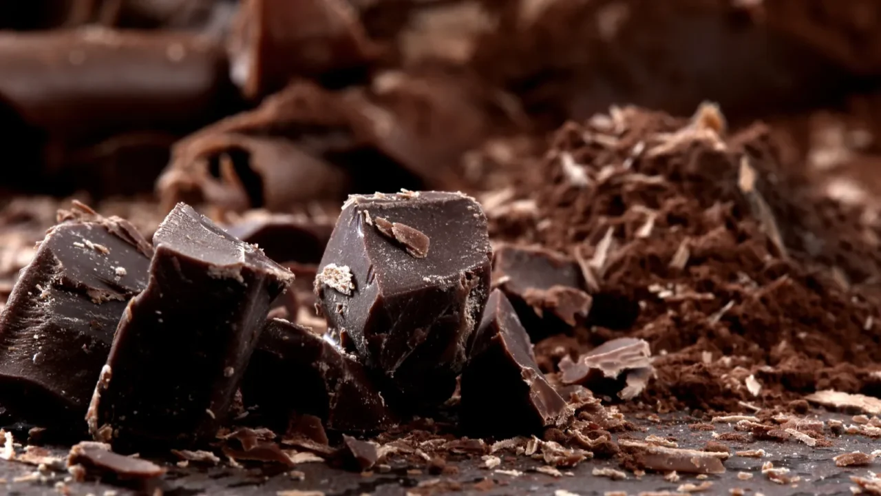 dark chocolate shavings on stone table