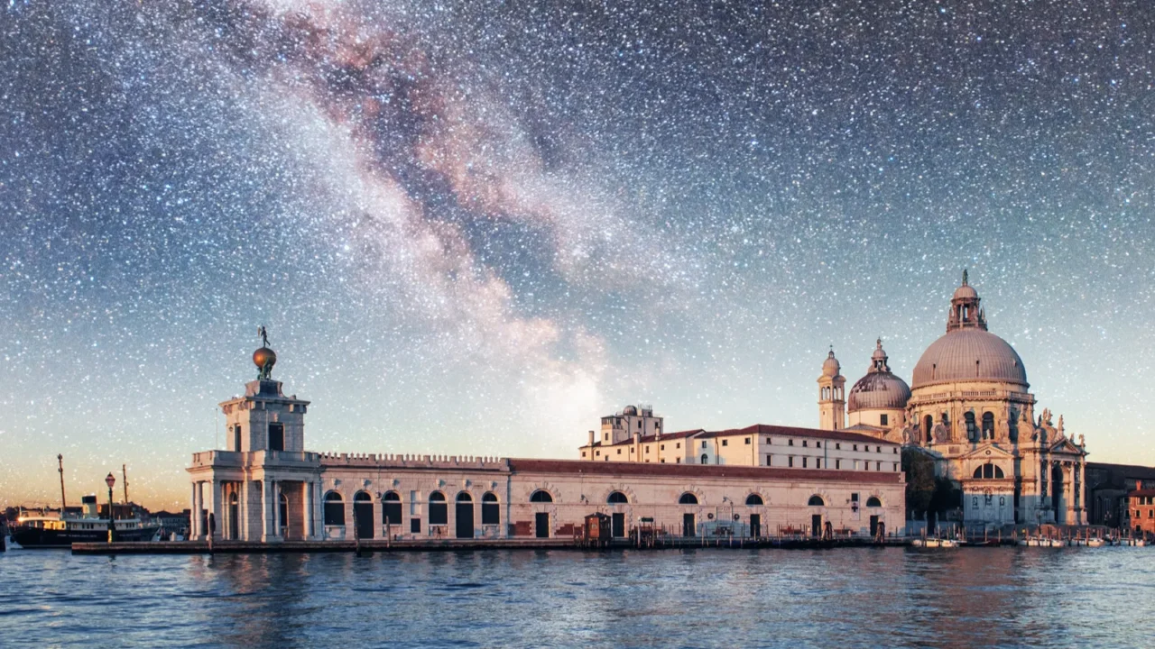 gondolas on the canal at night in venice san giorgio