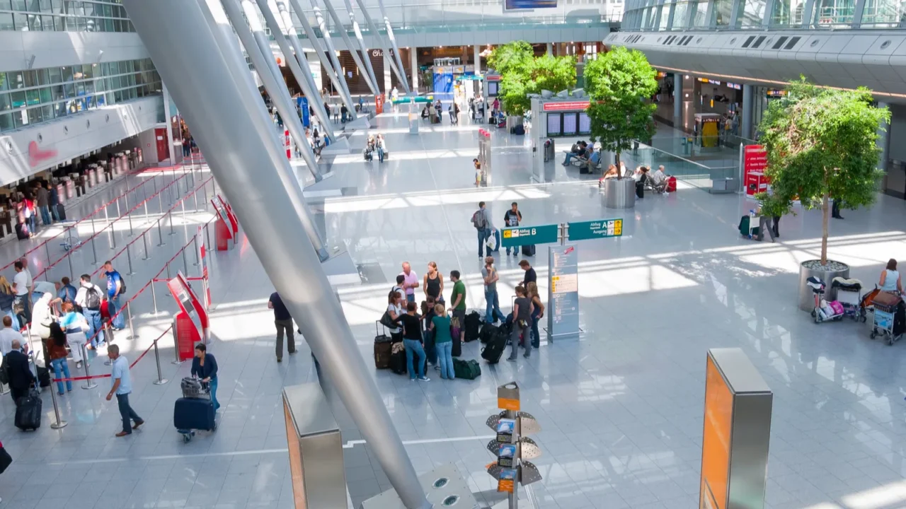 interior of modern international airport no recognizable faces and advertising