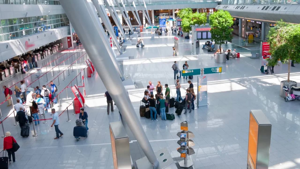 interior of modern international airport no recognizable faces and advertising