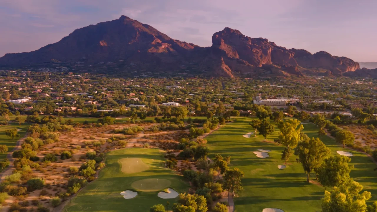 late evening sun glowing red on camelback mountain in phoenix