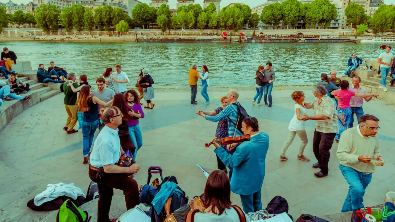 people dancing to live music in the streets of paris