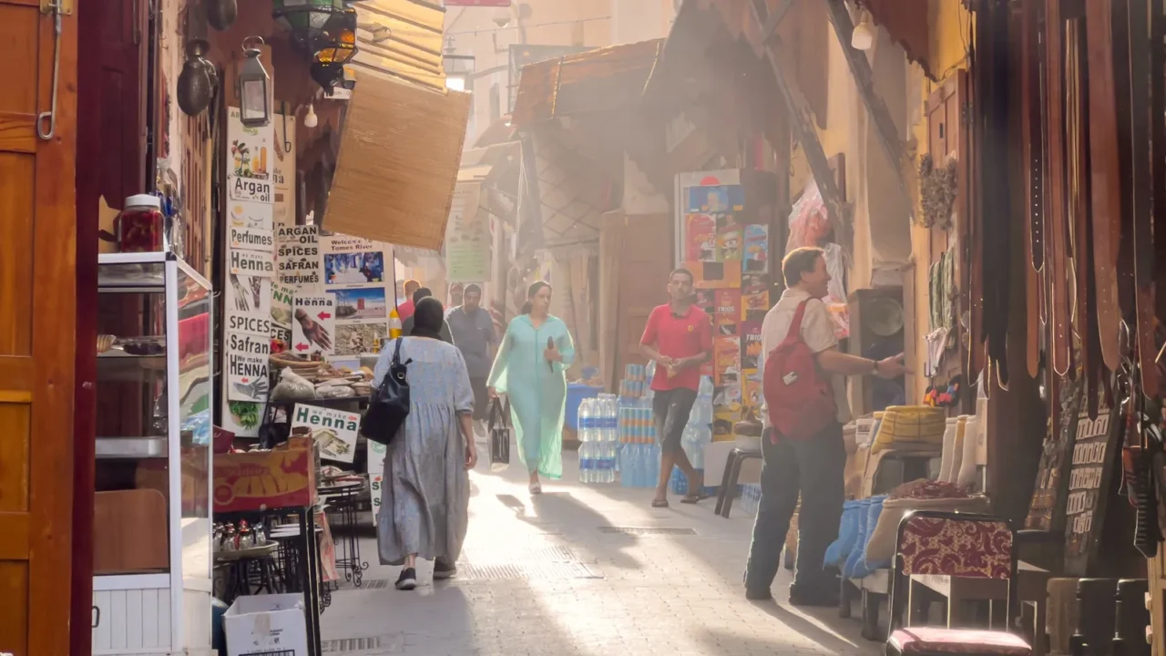 people walking in the old medina of fez