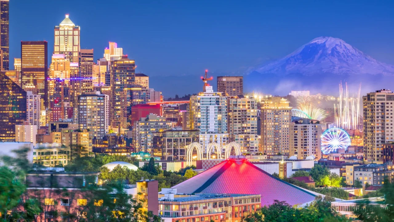 seattle washington usa downtown skyline at night with mt rainier