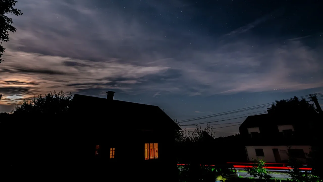 silhouette of village small house with moon stars heaven in