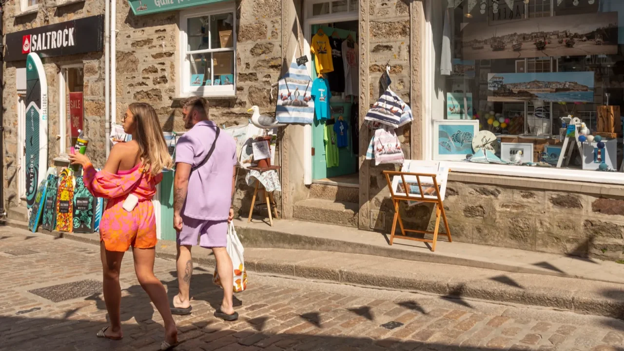 st ives cornwall england uk 2022 tourists window shopping outside