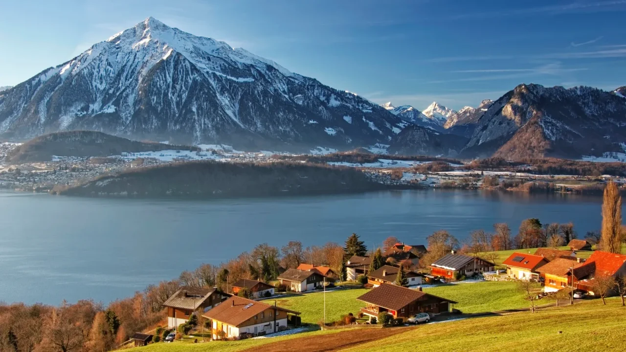 swiss alps mountains and lake view near thun lake in