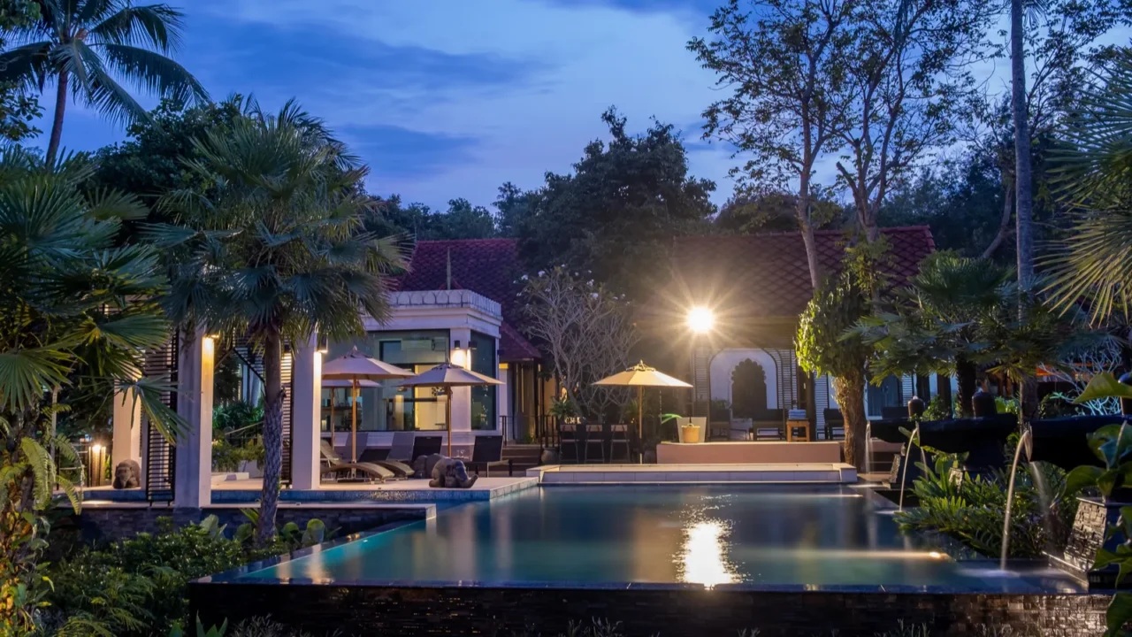 thai style house with pool thailand during sunset