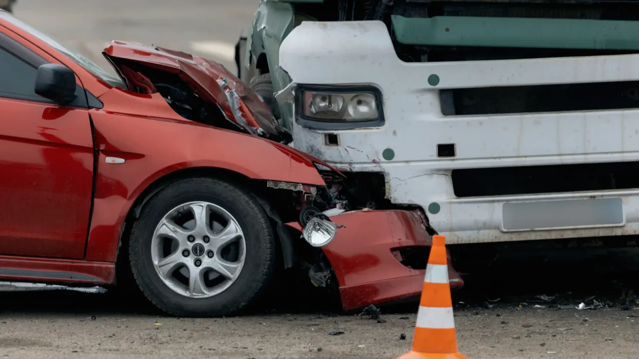 the aftermath of a headon collision between a car and