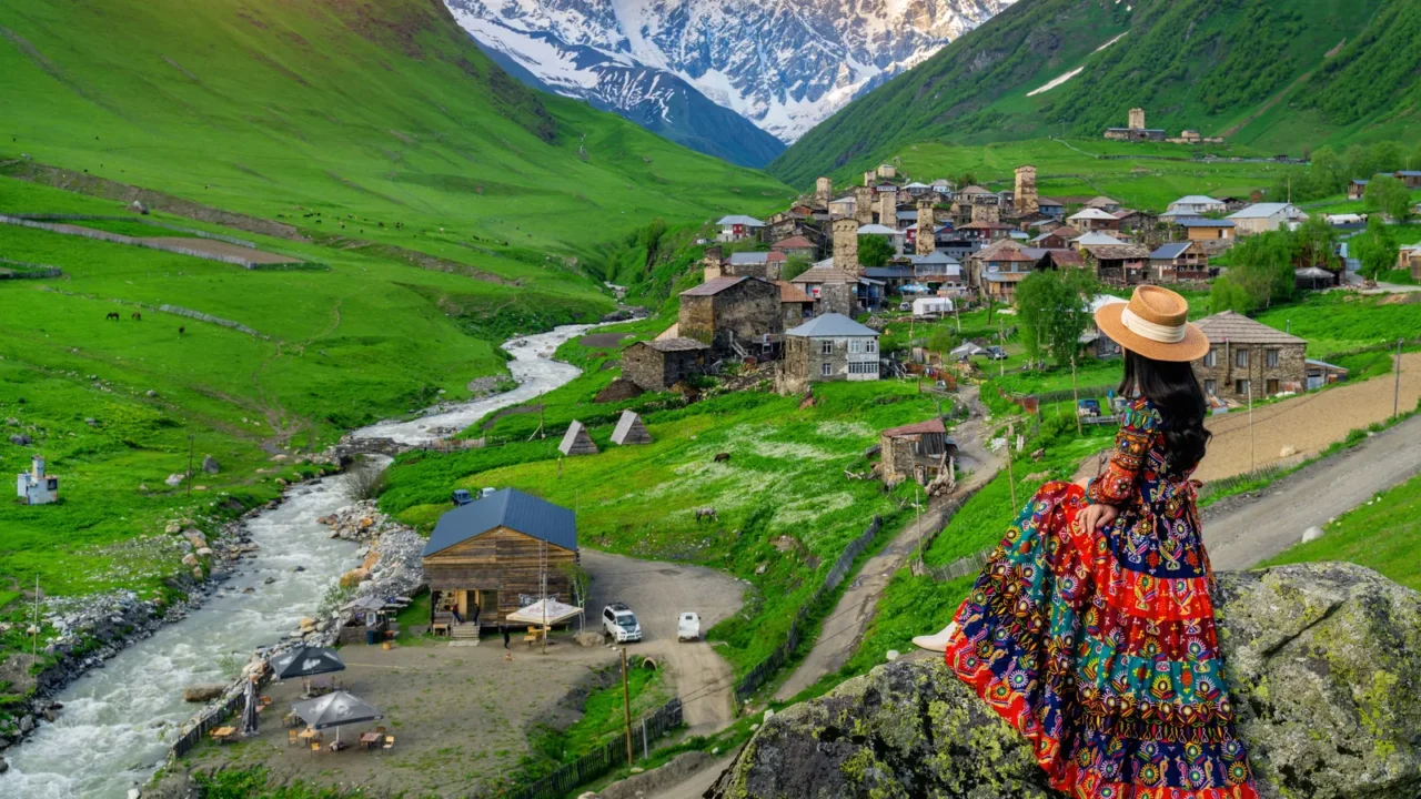 tourist enjoy view of ushguli village in georgia
