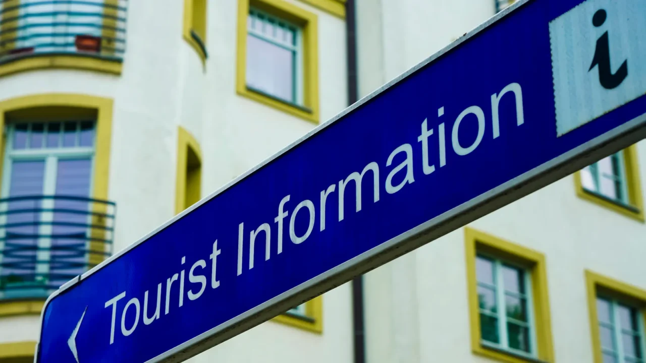 tourist information guided tours arrow signs blue tourist information directional