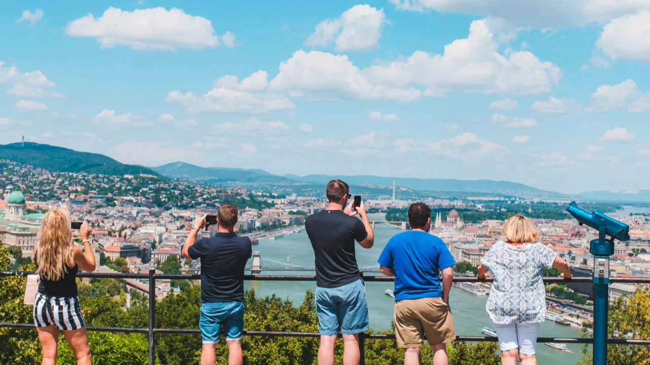tourists group looking of budapest panoramic view