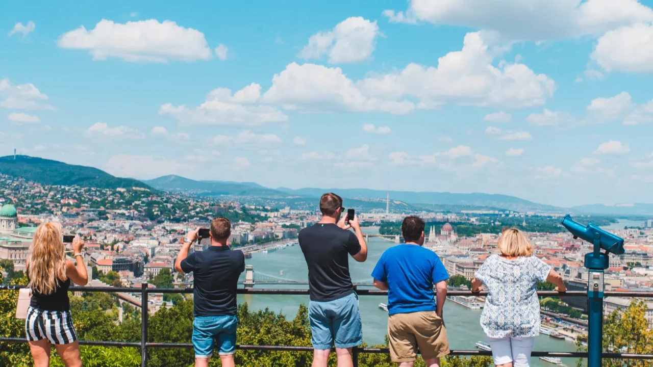 tourists group looking of budapest panoramic view