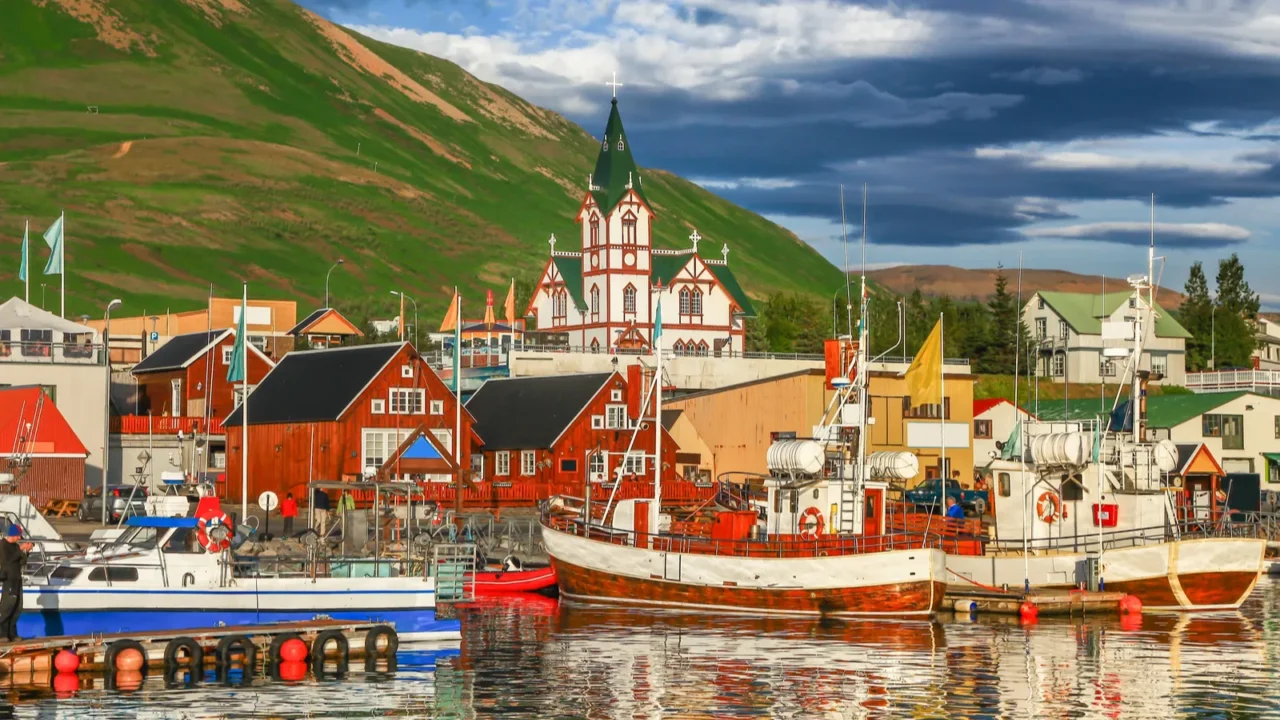 town of husavik at sunset north coast of iceland