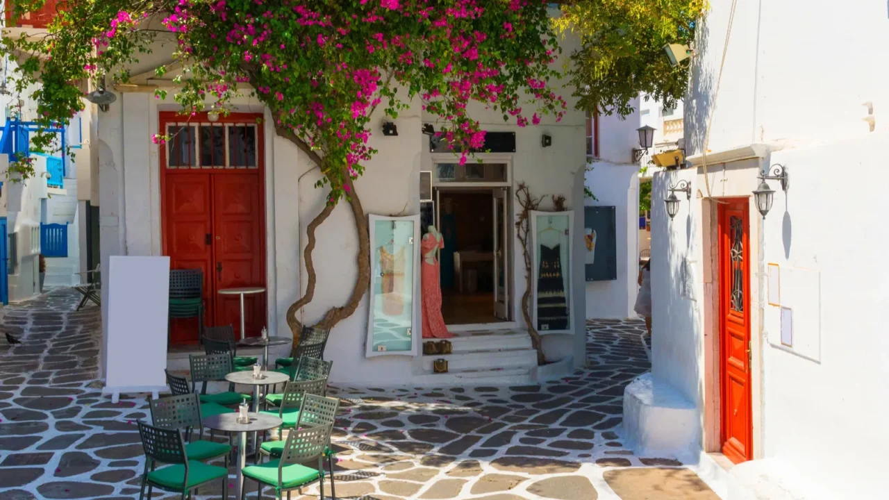 whitewashed narrow street in mykonos island cyclades greece