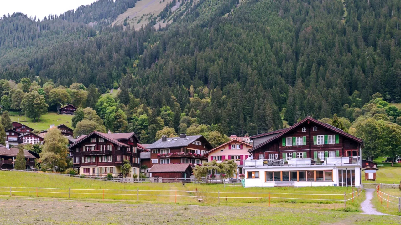 wooden houses in the murren mountains in switzerland on a