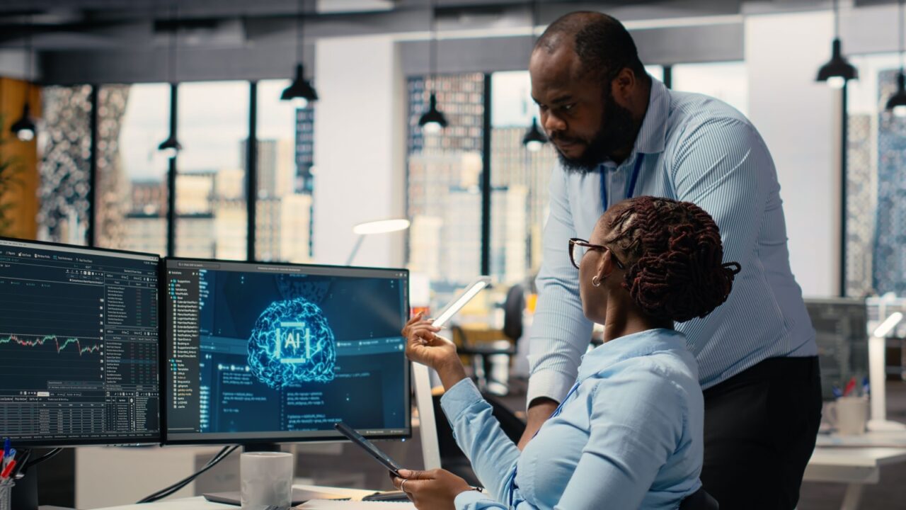 Prop firm staff members using artificial intelligence tech to ensure smooth trading operations. Team of traders in office using AI chatbot to analyze stock market portfolio positions