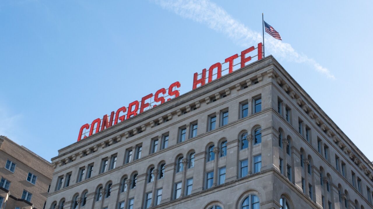 Chicago, IL/USA - May 31, 2020 View of the Congress hotel in Chicago. sky and flag in view