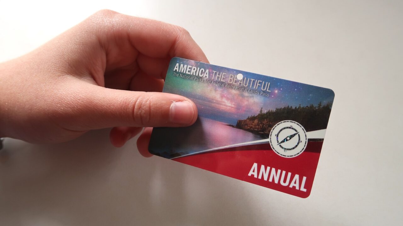 Estes Park, CO USA - July 1, 2023: America the Beautiful annual national park pass grants unlimited entry to all federal national parks in the USA