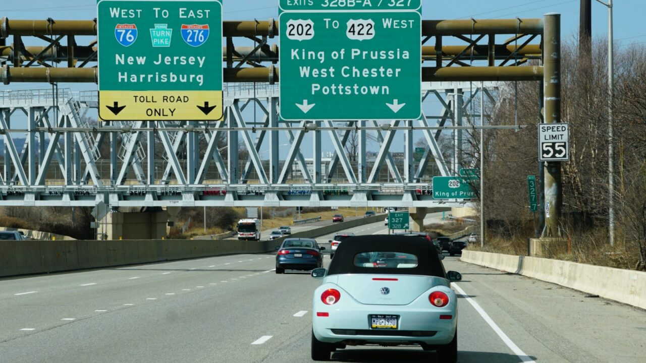 Pennsylvania, U.S.A - April 7, 2025 - Traffic on the highway with exits to King of Prussia, West Chester, Pottstown and PA Turnpike into New Jersey and Harrisburg