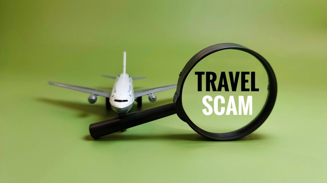 Air Travel Fraud Detected Through Magnifying Glass – Concept of Scam Alert, Airline Ticket Fraud, and Travel Risk Awareness in Online Bookings.